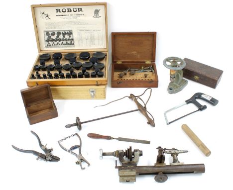Small cast iron lathe, 12" long overall; also a small quantity of clock tools etc 