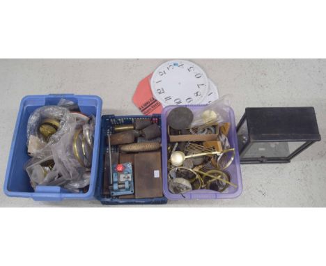Three cased clock tools and an ebonised cased set of scales; also a quantity of clock parts and fittings including weights, g
