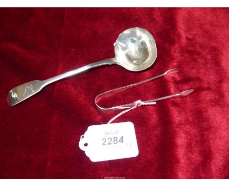 A Silver Ladle with bird engraving, (some dents), London 1832, makers 'WC' and a pair of Sugar tongs, Sheffield 1915, makers 