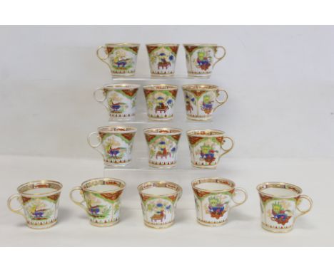 Fourteen early 19th century Chamberlain's Worcester porcelain coffee cups of flared form with C scroll ring handles, in the "