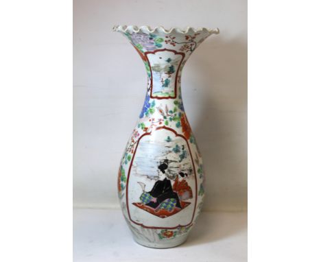 Japanese vase of baluster form with frilled rim decorated with panels of figures and landscape on floral and foliate ground. 