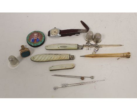 Silver and pearl fruit knife 1824, two others, a thimble by Charles Horner, Chester 1914, three others various, a silver cloa