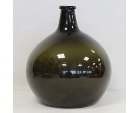 Late 17th/early 18th century onion shaped olive green glass wine bottle, 30.5cm high. Condition report:Age related scuff mark