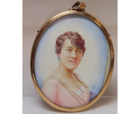 Late 19th century/early 20th century portrait of a lady, watercolour on ivory, 7cm x 5.5cm (oval), signed with initials S.H.,