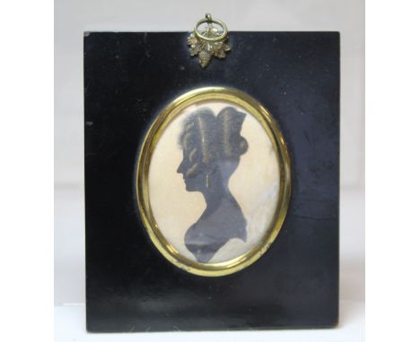 19th century English silhouette portrait of a lady, black gouache heightened with gilt, 7.5cm x 6cm (oval), in black lacquer 