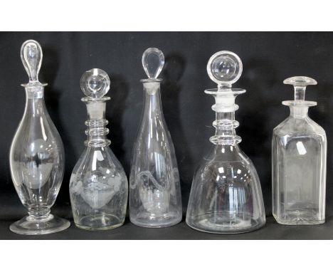 Whitefriars clear glass decanter designed by William Wilson, 1936, 33cm high; two triple ring neck decanters, one of tapered 