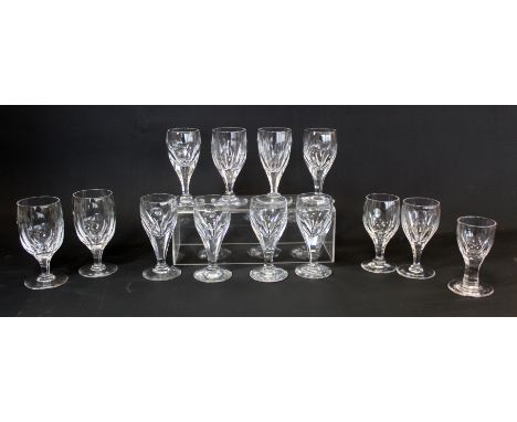 Set of eight small clear wine or liqueur glasses by Brierley, the rounded bowls on faceted drawn stems and domed circular foo