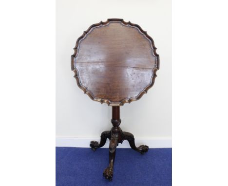 Georgian mahogany table in the Chippendale manner, pie crust top on bird cage mechanism on cannon barrel column and acanthus 