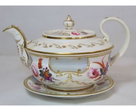 Early 19th century English porcelain teapot of Empire shape with matching circular stand with polychrome floral sprays, grey 