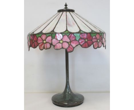 20th century Tiffany style table lamp, the leaded streaky opaque white flared shade with pink and green floral border on verd