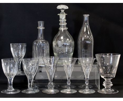 Antique small glass decanter of moulded mallet form with ringed neck and pronounced domed base, lacking stopper, 16.5cm high;