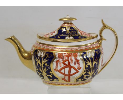 Early 19th century English Spode porcelain teapot of new oval shape decorated with 'Dollar' pattern in the Imari palette of i