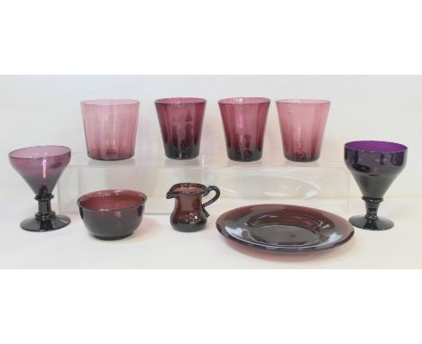 Nine pieces of Victorian and later amethyst glass comprising: two rummers with funnel shaped bowls, annular knops, plain shor