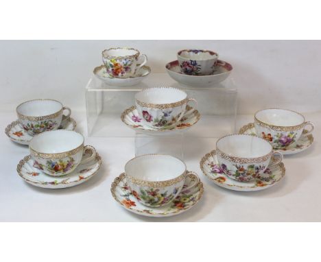 German Tiefenfurt porcelain cabinet cup and saucer with floral decoration; similar Dresden spiral fluted teacups and saucers 