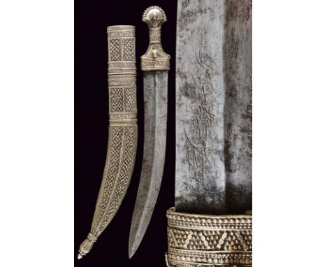 dating: Late 19th Century provenance: Oman, Double-edged, curved blade, ribbed in the center, with remains of inscriptions at