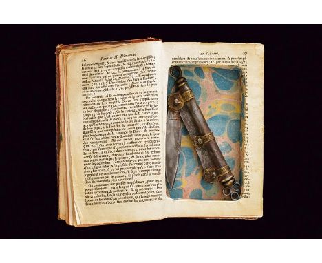 dating: 18th Century provenance: France, A knife with single-edged blade. Iron grip with brass mounts. A dynamometer on the b