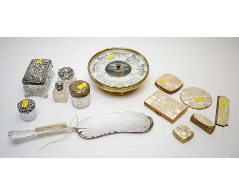 Assorted silver topped toilet jars/box; a glass cased barometer; mother-of-pearl compacts, etc.