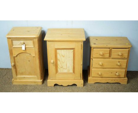 Three 20th Century pine bedside tables, comprising: one with rectangular top above a single frieze drawer and cupboard door b