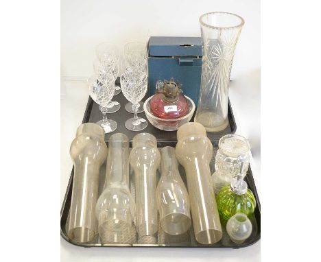 Vintage Oil Lamp; Bohemian cut drinking glasses; A tall glass vase and other glass items on two trays.