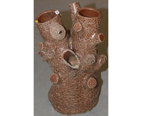 A 19th Century earthenware strawberry planter, naturalistically modelled as a tree trunk, 66cm high.