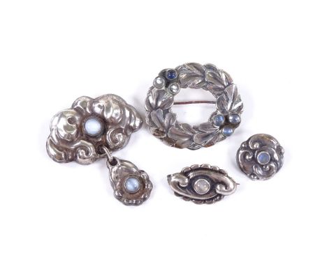 4 Art Nouveau Danish stylised silver and moonstone items of jewellery, comprising 1 pendant brooch, 2 brooches and 1 button, 