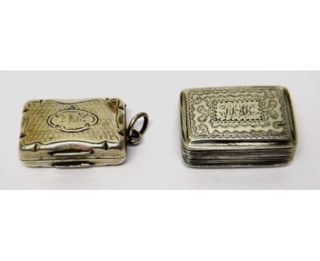 A silver rectangular vinaigrette, the cover and the underside with engraved decoration, otherwise reeded to the sides, Birmin