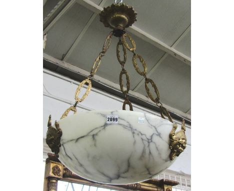 An alabaster and ormolu ceiling light, the veined dish with three foliate moulded bosses, suspended by three linked chains wi