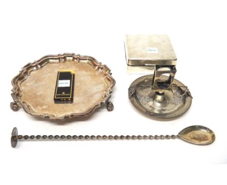 A silver circular matchbox holder cum ashtray, Birmingham 1906, a silver square cigarette box, wooden lined within, London 19