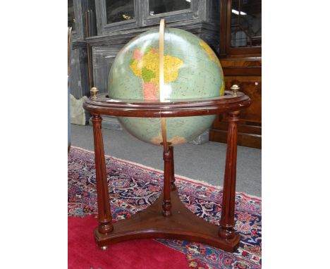 A 'Replogle Comprehensive Globe' on a hardwood stand, late 20th century, 78cm high.