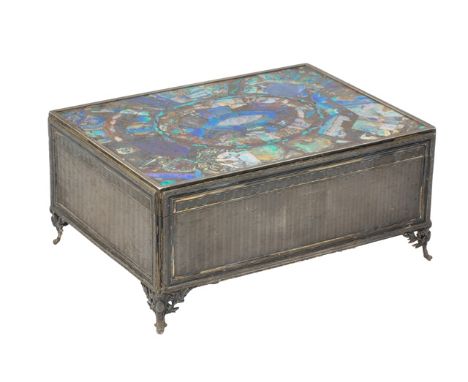 A late 19th century lady's silver and opal mounted rectangular hinge lidded bijouterie box, the matt gilt interior fitted wit