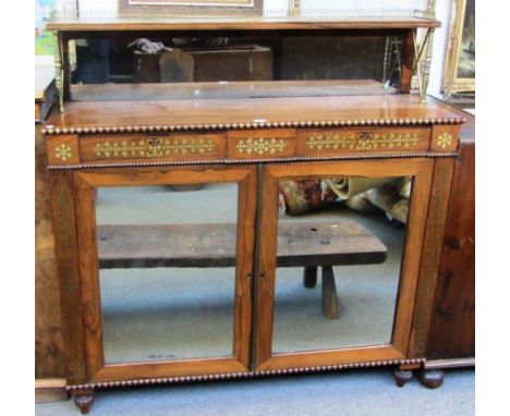 A Regency brass inlaid rosewood shelf back chiffonier with pair of drawers over cupboards on melon carved feet, 126cm wide. 