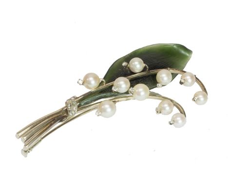 A white gold, diamond and cultured pearl set and carved nephrite brooch, designed as a spray of lily of the valley, the pin a