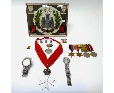 Four Second World War medals, comprising; The 1939-1945 Star, The Africa Star, with bar 8th Army, The Defence Medal and The W