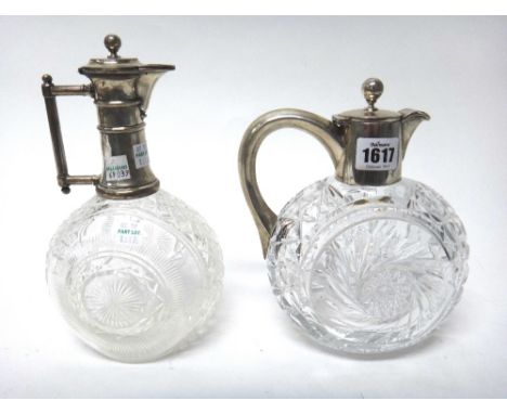 A German silver coloured metal mounted, faceted glass claret jug, of circular form, the hinged lid with a bead finial, detail