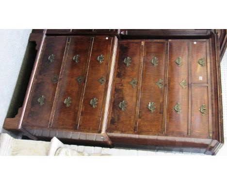 A mid 18th century figured walnut chest on chest of two short and six long graduated drawers on bracket feet, 100cm wide x 17