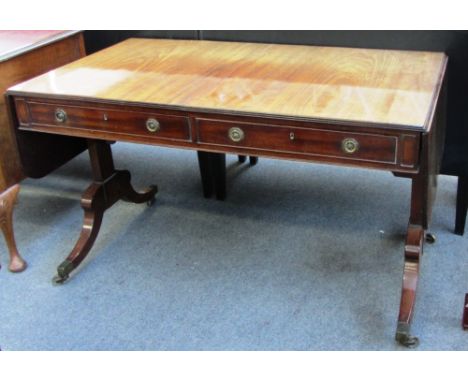 A Regency mahogany two drawer sofa table on trestle end standards, 122cm wide. 