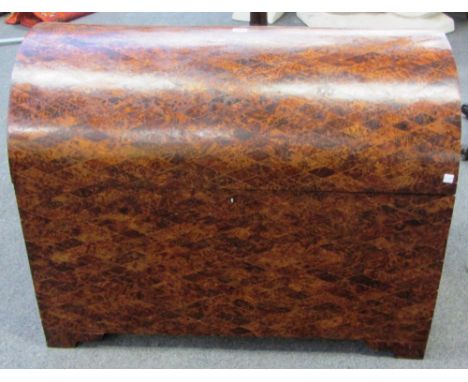 A 20th century parquetry veneered amboyna dome top trunk, 90cm wide.
