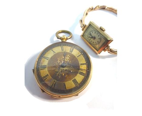 A lady's gold cased, key wind, openfaced fob watch, with an unsigned gilt cylinder movement, gilt metal inner case, the decor