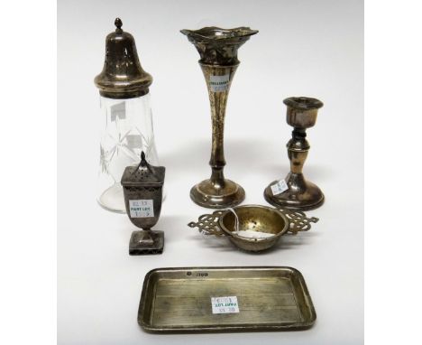 Silver and silver mounted wares, comprising; a rectangular trinket dish, an urn shaped pepperette, a twin handled tea straine