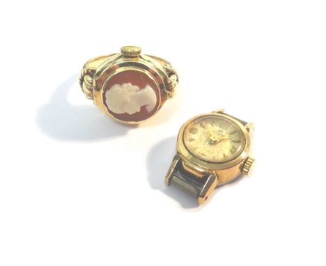 A 9ct gold and shell cameo mounted lady's Rotary ring watch, the signed circular dial, with gilt Arabic and baton shaped nume