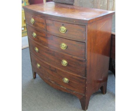 A Regency mahogany bowfront chest of two short and three long graduated drawers on bracket feet, 100cm wide. 
