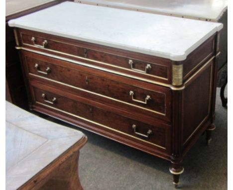 A 19th century French gilt metal mounted mahogany marble top commode with three long graduated drawers, on turned feet, 125cm