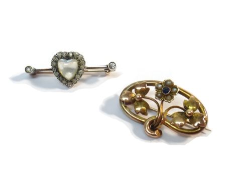 A moonstone and diamond set bar brooch, the centre in a heart shaped cluster design, the moonstone mounted with a diamond set