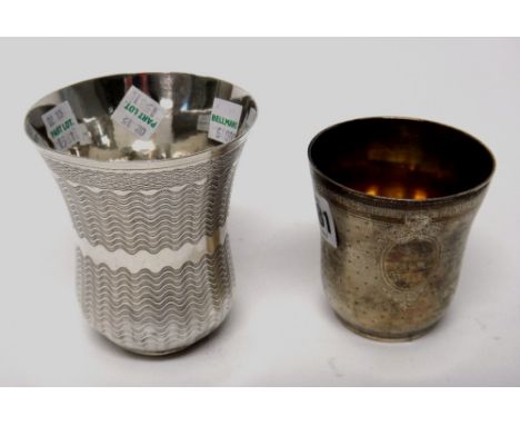 A French beaker, with engine turned decoration and a larger Turkish beaker, with wavy engine turned decoration.