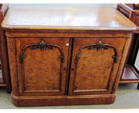 A Victorian burr oak metamorphic rising top buffet with pair of arch panel doors on plinth base, stamped 'Fryer & Son', 102cm