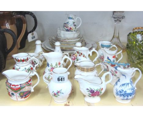 A set of twelve Royal Worcester commemorative porcelain jugs and a quantity of Royal Crown 'Derby Posies' porcelain (qty). 