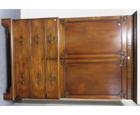 A George III mahogany linen press, the pair of doors over two short and two long graduated doors, on bracket feet, 127cm wide