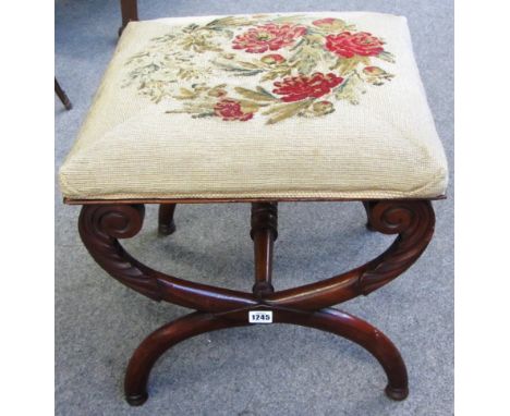 A 19th century mahogany foot stool on 'X' frame base, 43cm wide.