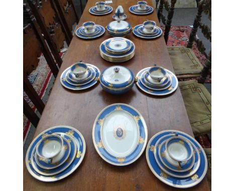 A Wedgwood porcelain part dinner service decorated in the 'Columbia' pattern, comprising; fifteen large dinner plates, twelve
