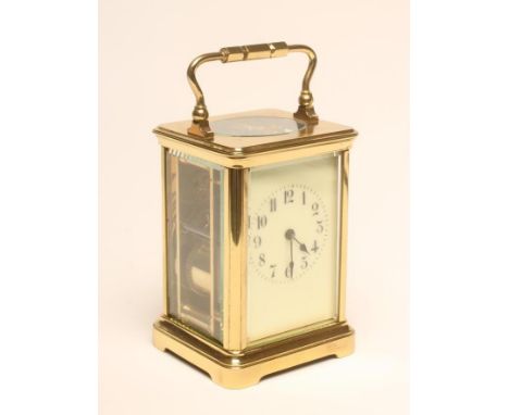 A FRENCH BRASS CASED CARRIAGE CLOCK, c.1900, the gong striking twin barrel movement regulated by a platform escapement, ivori